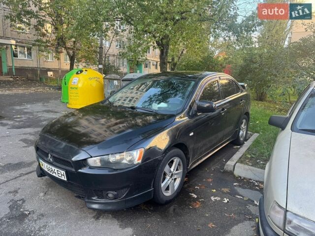 Чорний Міцубісі Lancer, об'ємом двигуна 2 л та пробігом 301 тис. км за 7300 $, фото 1 на Automoto.ua