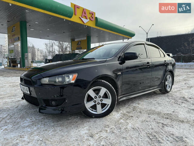 Черный Мицубиси Лансер, объемом двигателя 2 л и пробегом 195 тыс. км за 6800 $, фото 1 на Automoto.ua