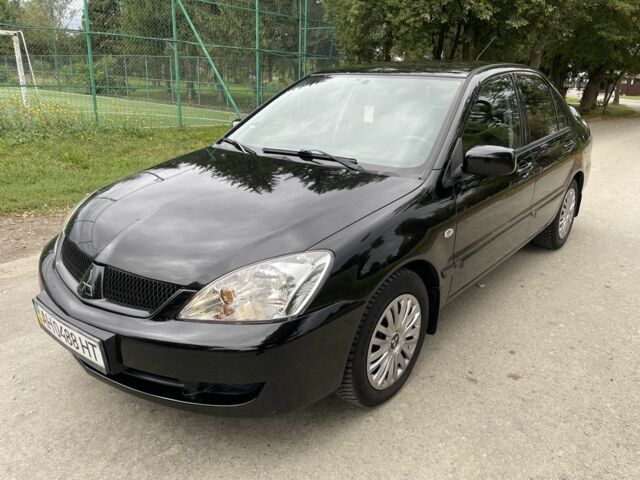 Чорний Міцубісі Lancer, об'ємом двигуна 1.6 л та пробігом 162 тис. км за 4199 $, фото 1 на Automoto.ua