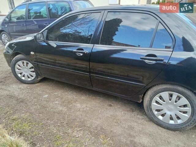 Черный Мицубиси Лансер, объемом двигателя 0 л и пробегом 212 тыс. км за 4700 $, фото 1 на Automoto.ua