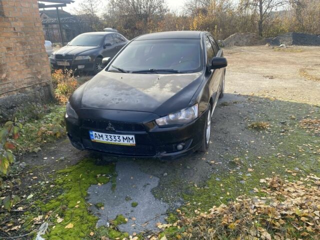 Черный Мицубиси Лансер, объемом двигателя 2 л и пробегом 190 тыс. км за 3100 $, фото 1 на Automoto.ua