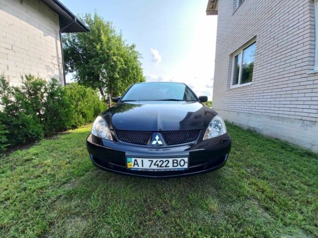 Чорний Міцубісі Lancer, об'ємом двигуна 1.6 л та пробігом 230 тис. км за 4700 $, фото 1 на Automoto.ua