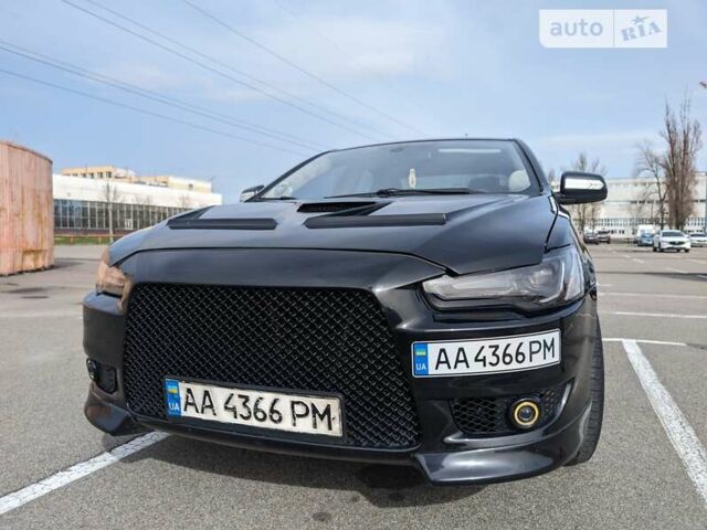 Чорний Міцубісі Lancer, об'ємом двигуна 2 л та пробігом 240 тис. км за 10500 $, фото 1 на Automoto.ua