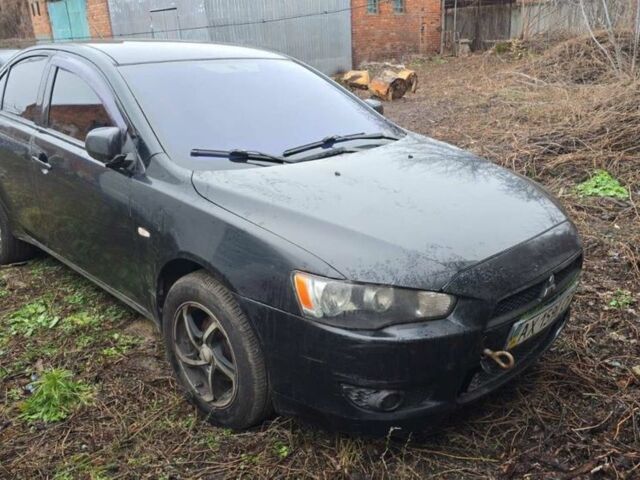 Черный Мицубиси Лансер, объемом двигателя 1.5 л и пробегом 300 тыс. км за 2500 $, фото 1 на Automoto.ua