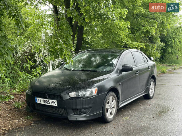 Чорний Міцубісі Lancer, об'ємом двигуна 2 л та пробігом 280 тис. км за 4400 $, фото 1 на Automoto.ua