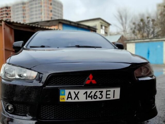 Чорний Міцубісі Lancer, об'ємом двигуна 2 л та пробігом 98 тис. км за 8000 $, фото 1 на Automoto.ua