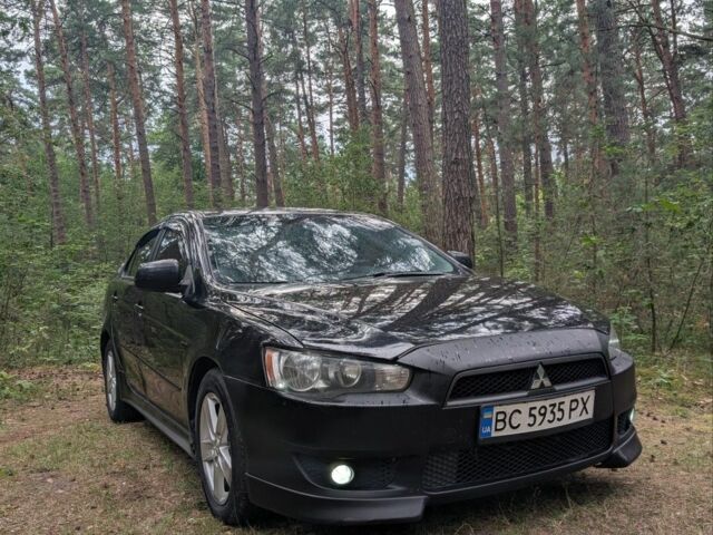 Чорний Міцубісі Lancer, об'ємом двигуна 2 л та пробігом 196 тис. км за 4603 $, фото 1 на Automoto.ua