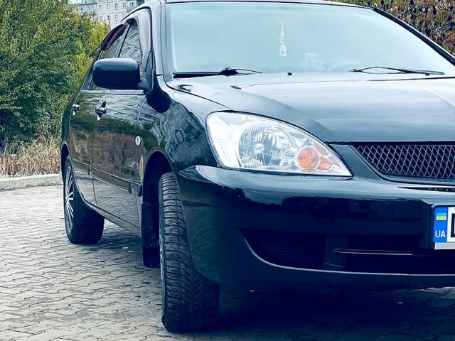 Чорний Міцубісі Lancer, об'ємом двигуна 16 л та пробігом 250 тис. км за 4500 $, фото 1 на Automoto.ua