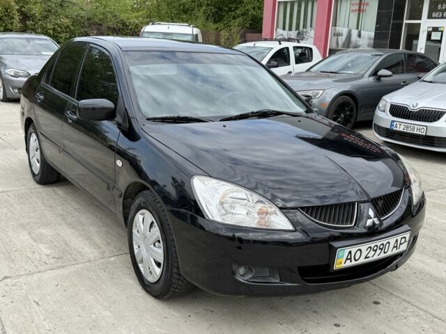 Чорний Міцубісі Lancer, об'ємом двигуна 1.6 л та пробігом 198 тис. км за 2842 $, фото 1 на Automoto.ua
