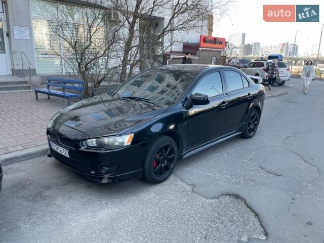 Чорний Міцубісі Lancer, об'ємом двигуна 2 л та пробігом 319 тис. км за 6800 $, фото 1 на Automoto.ua