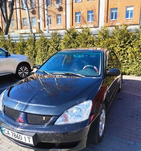 Чорний Міцубісі Lancer, об'ємом двигуна 1.58 л та пробігом 274 тис. км за 5000 $, фото 1 на Automoto.ua