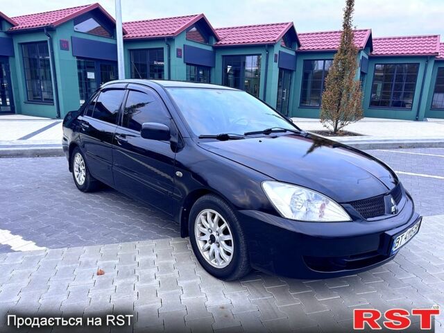 Чорний Міцубісі Lancer, об'ємом двигуна 1.6 л та пробігом 300 тис. км за 4650 $, фото 1 на Automoto.ua