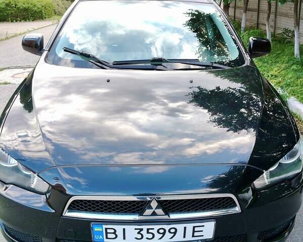 Черный Мицубиси Лансер, объемом двигателя 1.8 л и пробегом 172 тыс. км за 7100 $, фото 1 на Automoto.ua