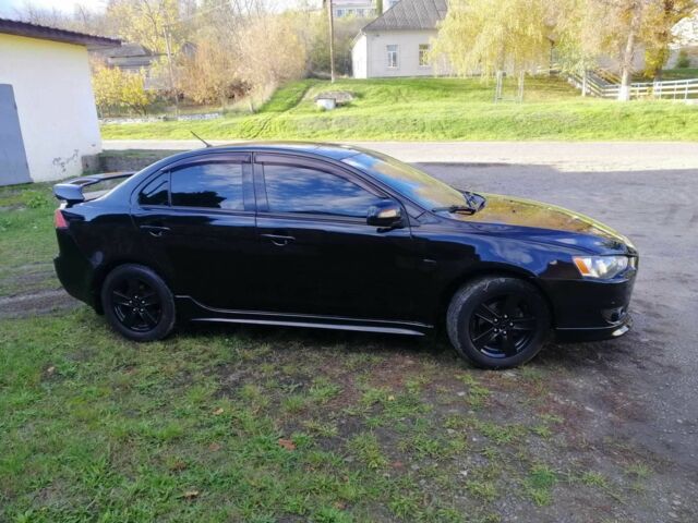 Міцубісі Lancer 2008 у Києві на Automoto.ua Чорний Міцубісі Lancer, об'ємом двигуна 2 л та пробігом 196 тис. км за 5500 $, фото 1 на Automoto.ua