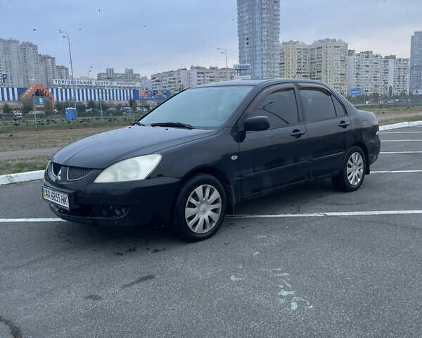 Міцубісі Lancer 2008 у Києві на Automoto.ua Чорний Міцубісі Lancer, об'ємом двигуна 1.58 л та пробігом 300 тис. км за 3800 $, фото 1 на Automoto.ua