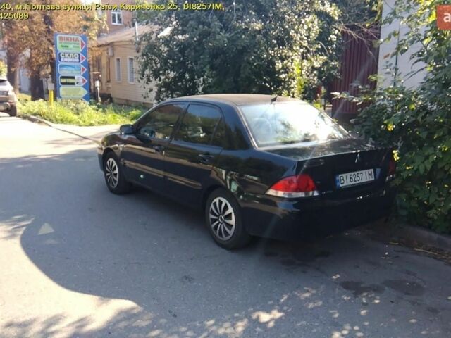Чорний Міцубісі Lancer, об'ємом двигуна 1.6 л та пробігом 420 тис. км за 3200 $, фото 1 на Automoto.ua
