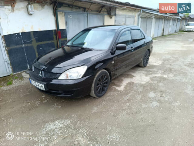 Чорний Міцубісі Lancer, об'ємом двигуна 1.6 л та пробігом 335 тис. км за 4260 $, фото 1 на Automoto.ua