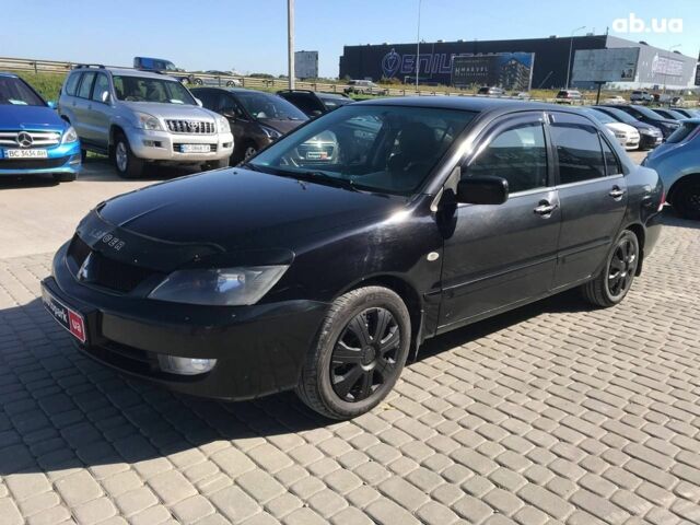 Чорний Міцубісі Lancer, об'ємом двигуна 1.6 л та пробігом 356 тис. км за 4590 $, фото 1 на Automoto.ua