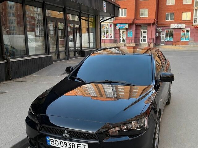 Чорний Міцубісі Lancer, об'ємом двигуна 2 л та пробігом 171 тис. км за 6900 $, фото 1 на Automoto.ua