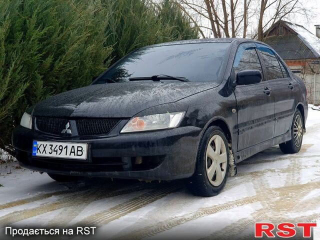 Чорний Міцубісі Lancer, об'ємом двигуна 1.6 л та пробігом 380 тис. км за 3999 $, фото 1 на Automoto.ua