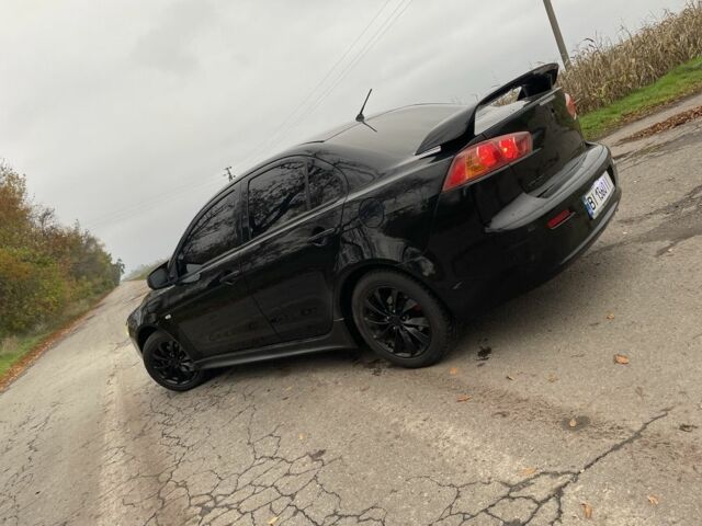 Чорний Міцубісі Lancer, об'ємом двигуна 2 л та пробігом 400 тис. км за 4396 $, фото 1 на Automoto.ua