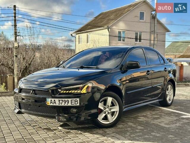 Чорний Міцубісі Lancer, об'ємом двигуна 2 л та пробігом 150 тис. км за 7999 $, фото 1 на Automoto.ua