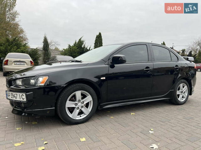 Чорний Міцубісі Lancer, об'ємом двигуна 2 л та пробігом 216 тис. км за 7150 $, фото 1 на Automoto.ua