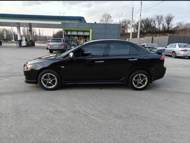 Черный Мицубиси Лансер, объемом двигателя 2 л и пробегом 3 тыс. км за 5300 $, фото 1 на Automoto.ua