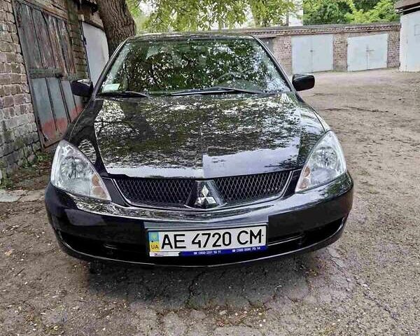 Чорний Міцубісі Lancer, об'ємом двигуна 1.6 л та пробігом 55 тис. км за 6500 $, фото 1 на Automoto.ua