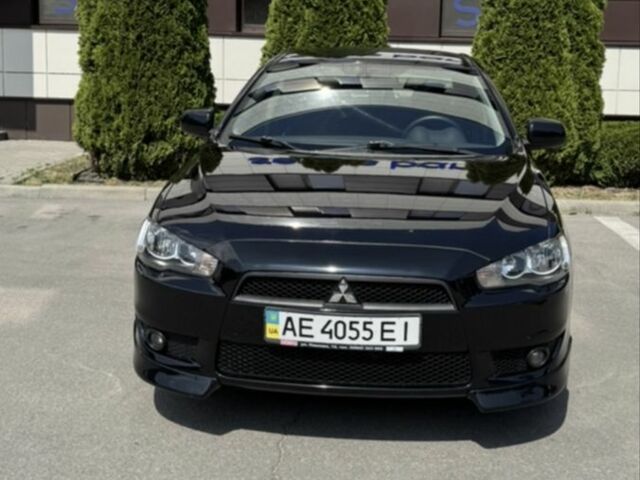 Чорний Міцубісі Lancer, об'ємом двигуна 2 л та пробігом 217 тис. км за 7700 $, фото 1 на Automoto.ua