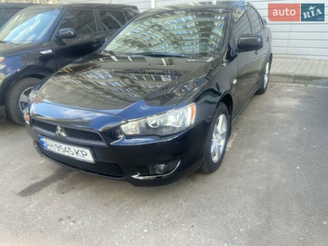 Чорний Міцубісі Lancer, об'ємом двигуна 2 л та пробігом 180 тис. км за 7800 $, фото 1 на Automoto.ua