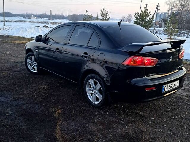 Черный Мицубиси Лансер, объемом двигателя 1.5 л и пробегом 260 тыс. км за 5900 $, фото 1 на Automoto.ua