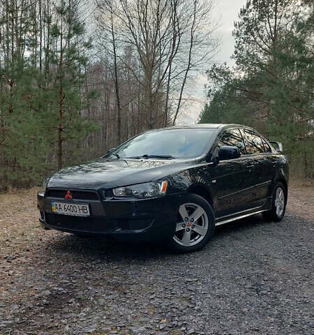 Черный Мицубиси Лансер, объемом двигателя 1.5 л и пробегом 295 тыс. км за 5650 $, фото 1 на Automoto.ua