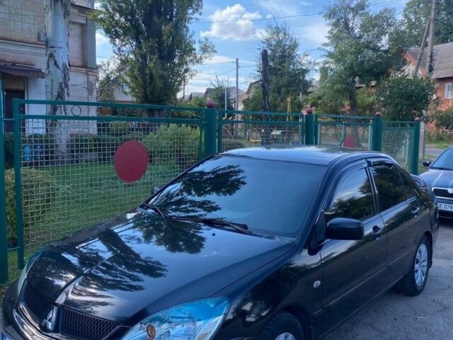 Міцубісі Lancer 2008 у Кривому Розі на Automoto.ua Чорний Міцубісі Lancer, об'ємом двигуна 1.6 л та пробігом 230 тис. км за 4380 $, фото 1 на Automoto.ua