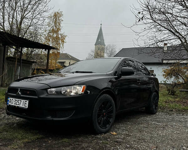 Черный Мицубиси Лансер, объемом двигателя 1.5 л и пробегом 278 тыс. км за 4200 $, фото 1 на Automoto.ua