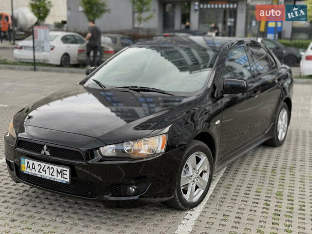 Чорний Міцубісі Lancer, об'ємом двигуна 2 л та пробігом 220 тис. км за 5850 $, фото 1 на Automoto.ua