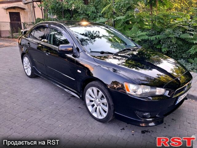 Чорний Міцубісі Lancer, об'ємом двигуна 2 л та пробігом 165 тис. км за 7500 $, фото 1 на Automoto.ua
