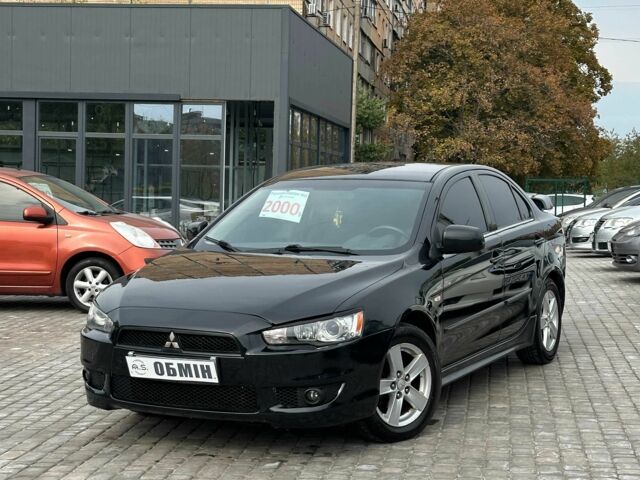 Чорний Міцубісі Lancer, об'ємом двигуна 2 л та пробігом 239 тис. км за 6900 $, фото 1 на Automoto.ua