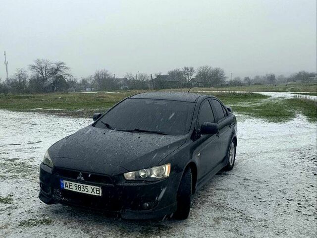 Чорний Міцубісі Lancer, об'ємом двигуна 2 л та пробігом 19100 тис. км за 6000 $, фото 1 на Automoto.ua