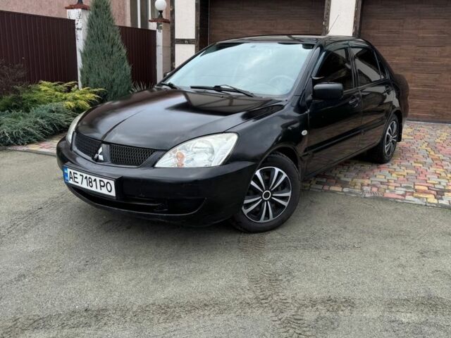 Чорний Міцубісі Lancer, об'ємом двигуна 1.6 л та пробігом 220 тис. км за 3600 $, фото 1 на Automoto.ua