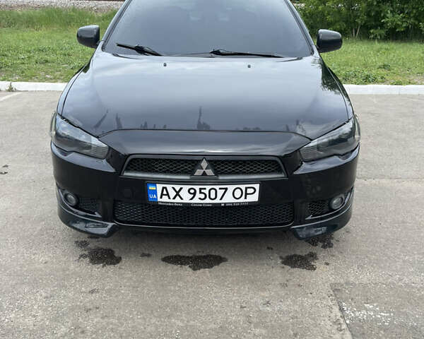 Черный Мицубиси Лансер, объемом двигателя 1.5 л и пробегом 233 тыс. км за 5300 $, фото 1 на Automoto.ua