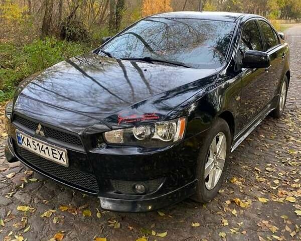 Чорний Міцубісі Lancer, об'ємом двигуна 2 л та пробігом 237 тис. км за 7500 $, фото 1 на Automoto.ua