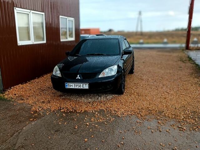 Чорний Міцубісі Lancer, об'ємом двигуна 1.6 л та пробігом 0 тис. км за 4200 $, фото 1 на Automoto.ua