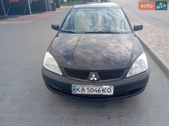 Чорний Міцубісі Lancer, об'ємом двигуна 1.6 л та пробігом 287 тис. км за 4300 $, фото 1 на Automoto.ua