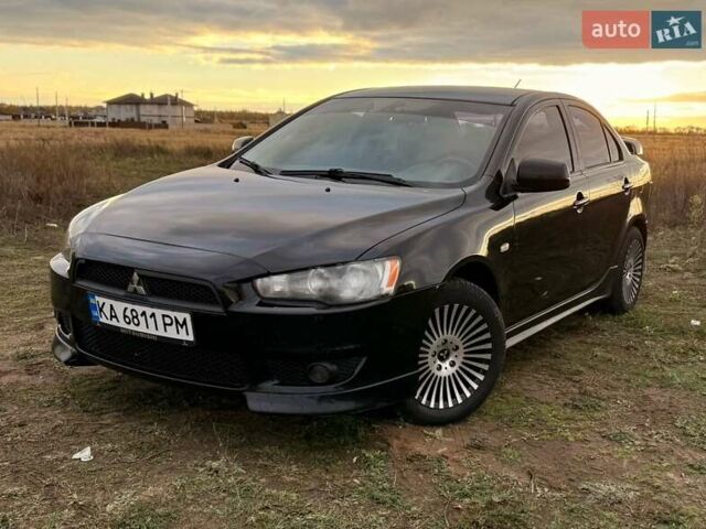 Чорний Міцубісі Lancer, об'ємом двигуна 2 л та пробігом 204 тис. км за 7500 $, фото 1 на Automoto.ua