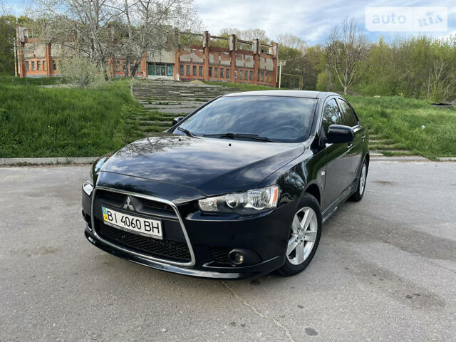 Чорний Міцубісі Lancer, об'ємом двигуна 2 л та пробігом 164 тис. км за 7950 $, фото 1 на Automoto.ua