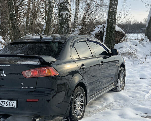 Чорний Міцубісі Lancer, об'ємом двигуна 2 л та пробігом 200 тис. км за 7200 $, фото 1 на Automoto.ua