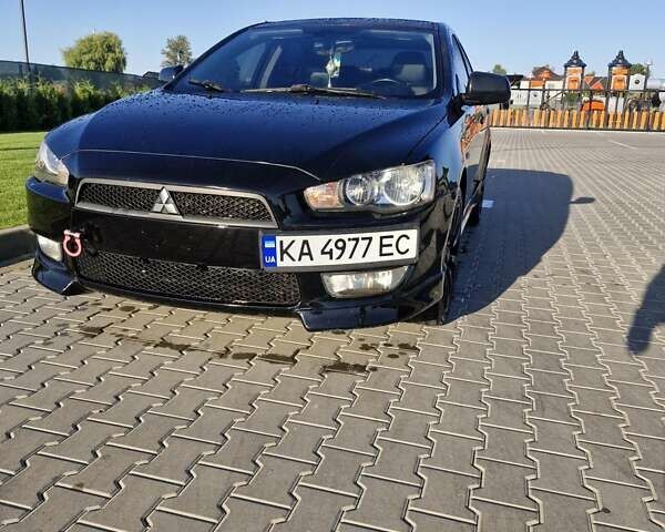 Чорний Міцубісі Lancer, об'ємом двигуна 2 л та пробігом 183 тис. км за 7200 $, фото 1 на Automoto.ua