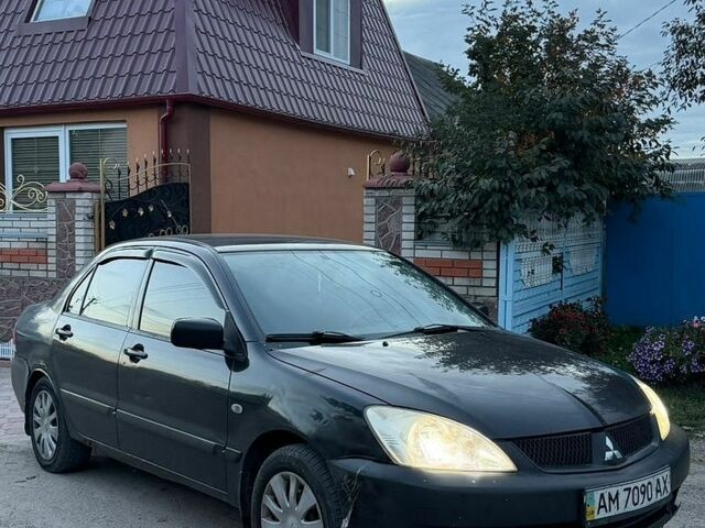 Чорний Міцубісі Lancer, об'ємом двигуна 1.62 л та пробігом 250 тис. км за 2250 $, фото 1 на Automoto.ua