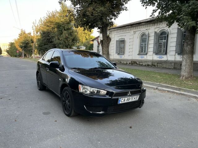Черный Мицубиси Лансер, объемом двигателя 1.5 л и пробегом 158 тыс. км за 5500 $, фото 1 на Automoto.ua